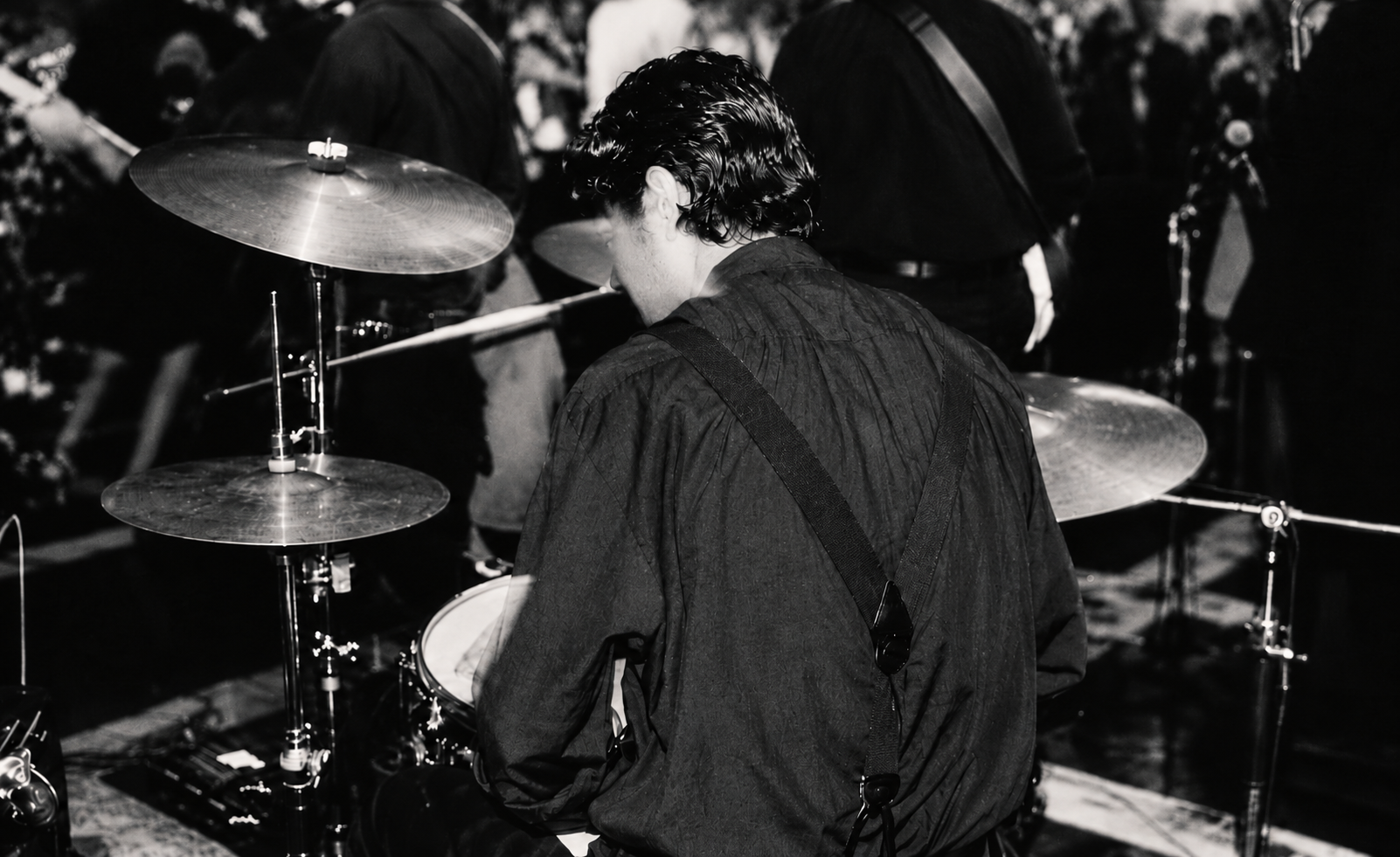 Eduardo Guerrero performing behind his drum kit
